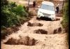 Land Rover Power Conquering Holes Torture test potholes 1
