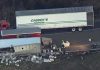 overturned truck spill vodka accident damage 2