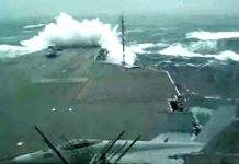 USS Kitty Hawk Aircraft Carrier Sails During Massive Storm With Huge Waves 1