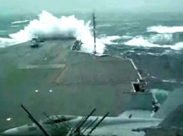 USS Kitty Hawk Aircraft Carrier Sails During Massive Storm With Huge Waves 1